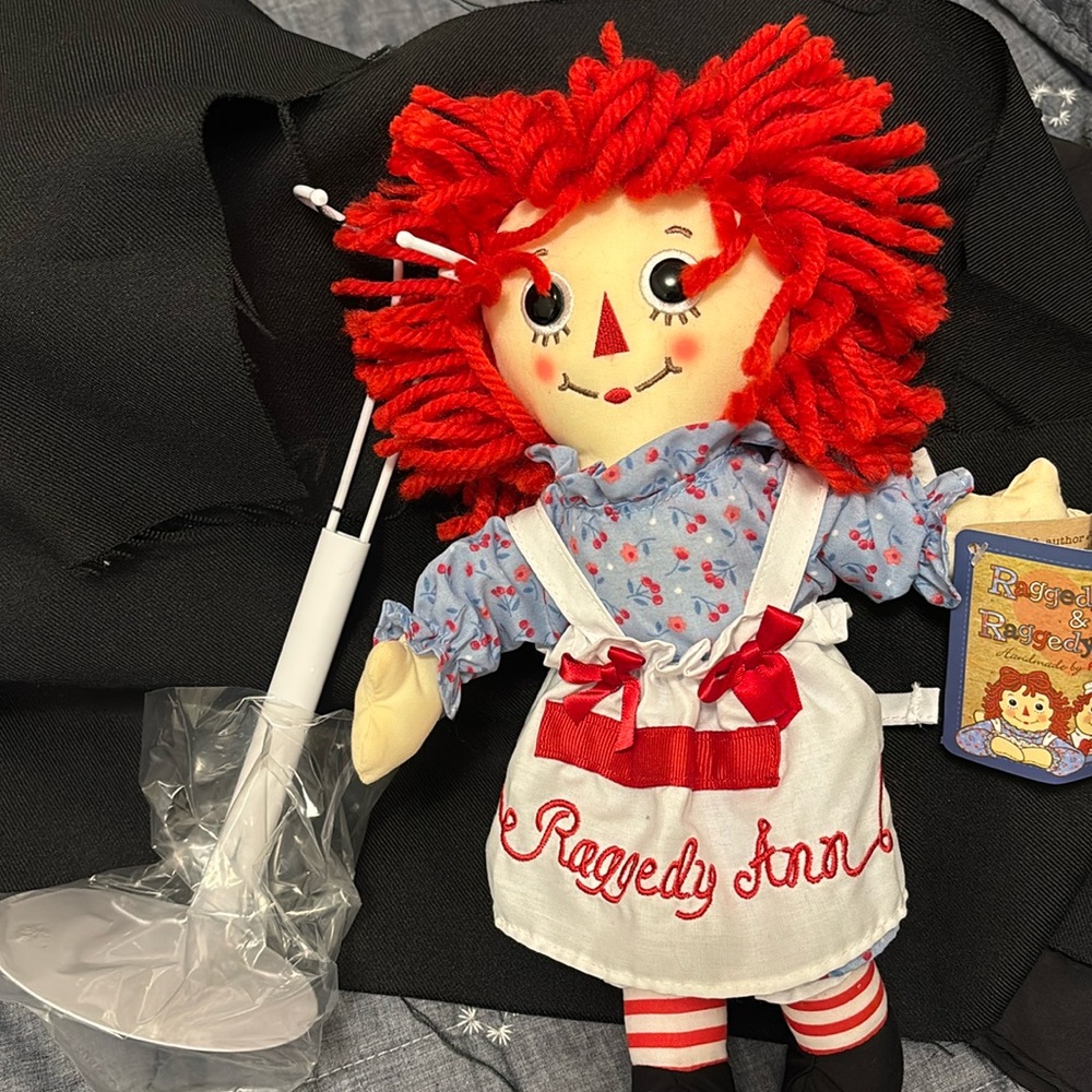 Raggedy Ann doll and metal stand